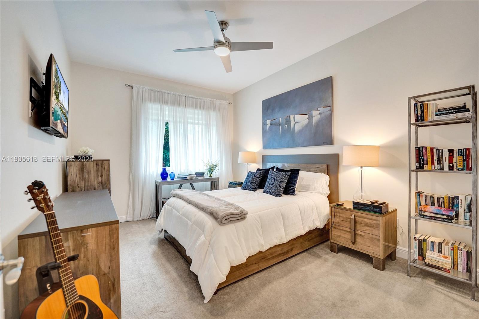 516 Hendricks Isle, Unit 2C Fort Lauderdale, FL 33301 - Photo 46 of 77 a bedroom with a bed furniture and a window