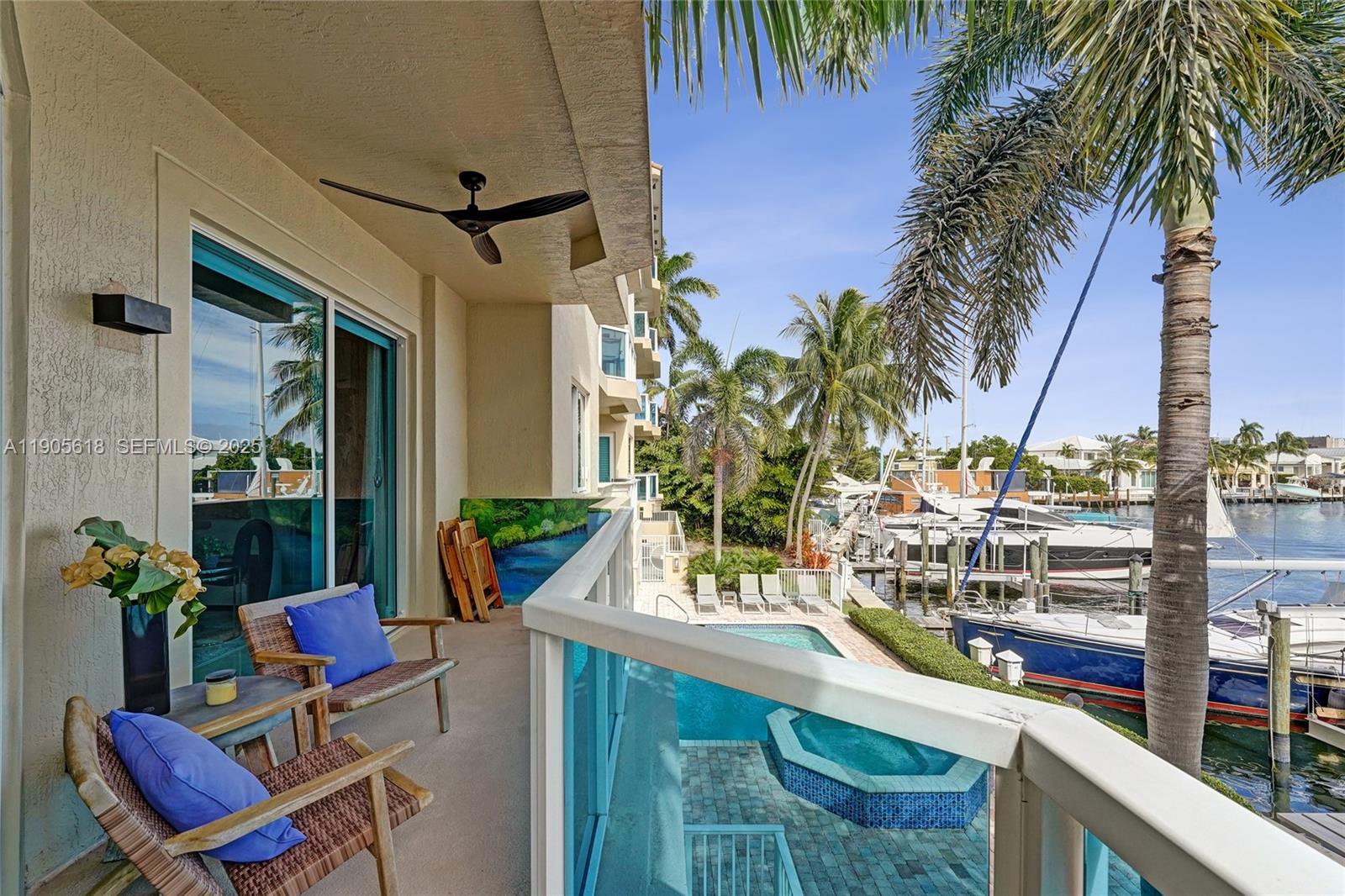 516 Hendricks Isle, Unit 2C Fort Lauderdale, FL 33301 - Photo 54 of 77 a view of balcony with chairs and potted plants