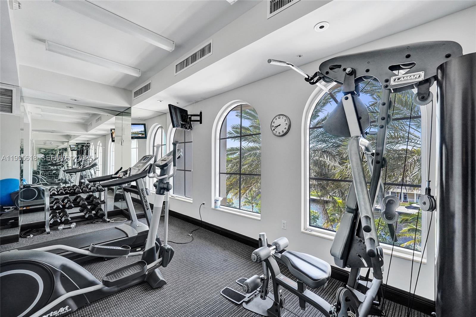 516 Hendricks Isle, Unit 2C Fort Lauderdale, FL 33301 - Photo 60 of 77 a view of a room with gym equipment