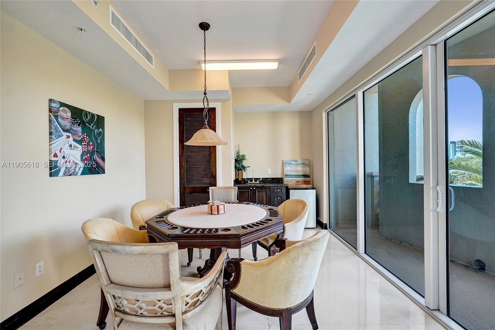 516 Hendricks Isle, Unit 2C Fort Lauderdale, FL 33301 - Photo 62 of 77 a view of a dining room with furniture