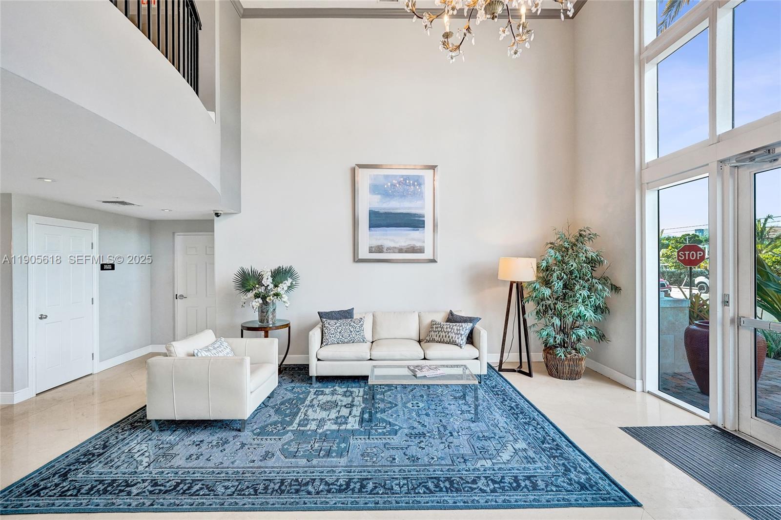 516 Hendricks Isle, Unit 2C Fort Lauderdale, FL 33301 - Photo 65 of 77 a living room with furniture and a rug