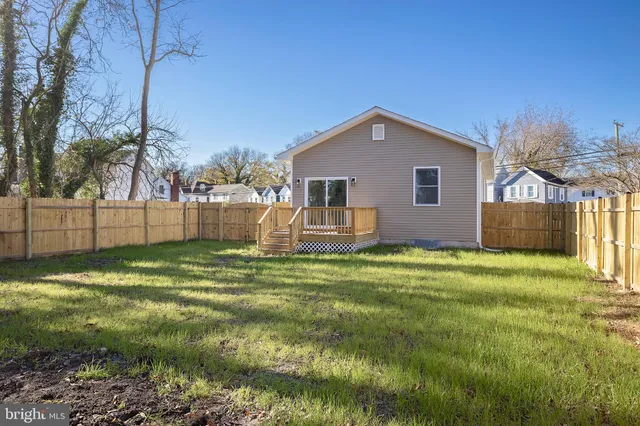 a view of a backyard with a garden and plants