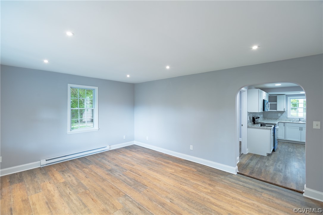 2440 Dupuy Road Petersburg, VA 23803 - Photo 13 of 25 a view of a kitchen with wooden floor and a sink