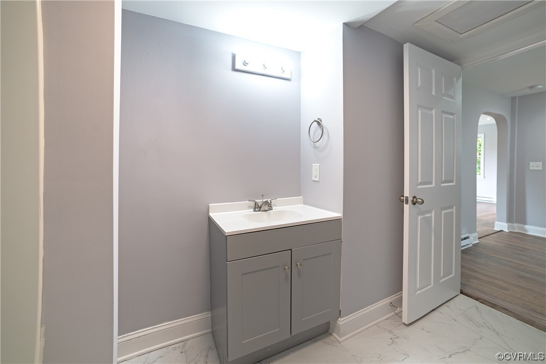 2440 Dupuy Road Petersburg, VA 23803 - Photo 23 of 25 a bathroom with a sink and mirror