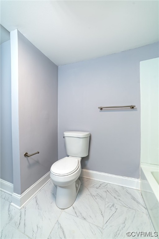 2440 Dupuy Road Petersburg, VA 23803 - Photo 25 of 25 a white toilet sitting next to a bathroom sink