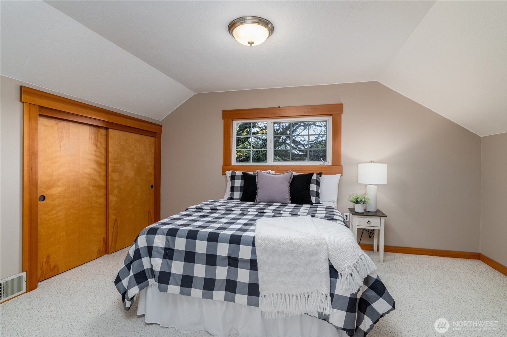 5981 Southeast Arcadia Road Shelton, WA 98584 - Photo 19 of 35 a bedroom with a bed and window