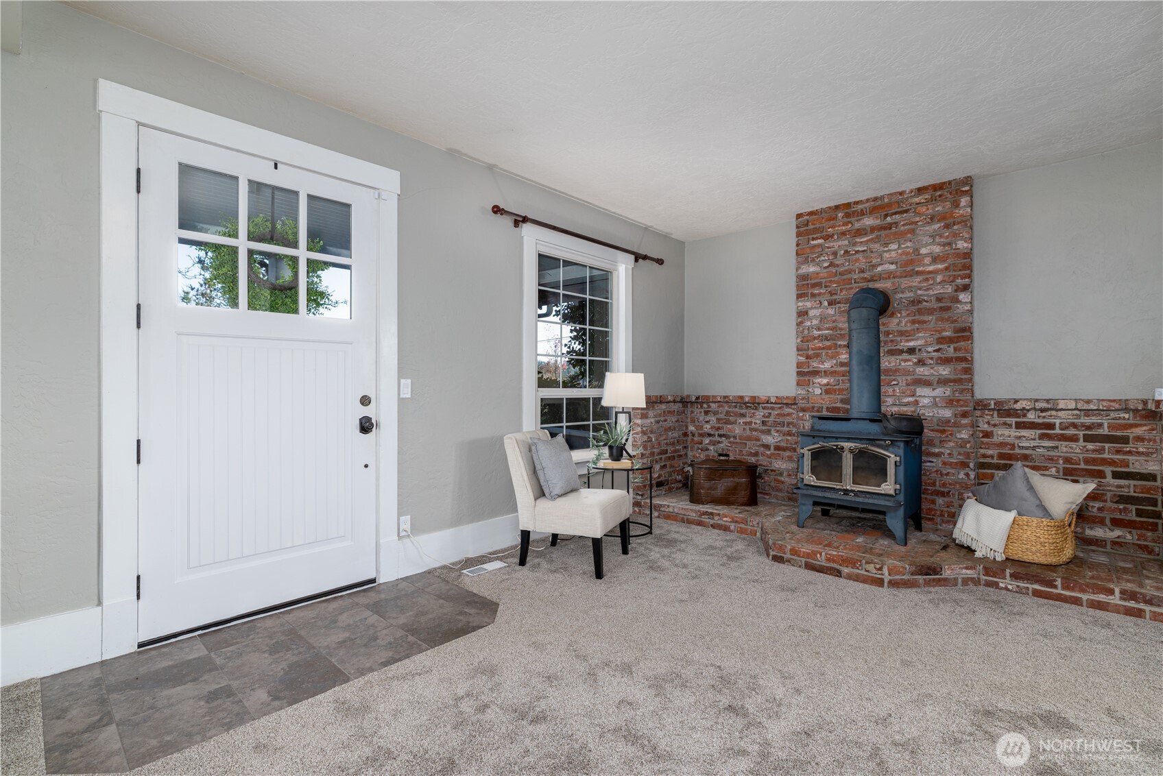 5981 Southeast Arcadia Road Shelton, WA 98584 - Photo 3 of 35 a living room with furniture and a fireplace