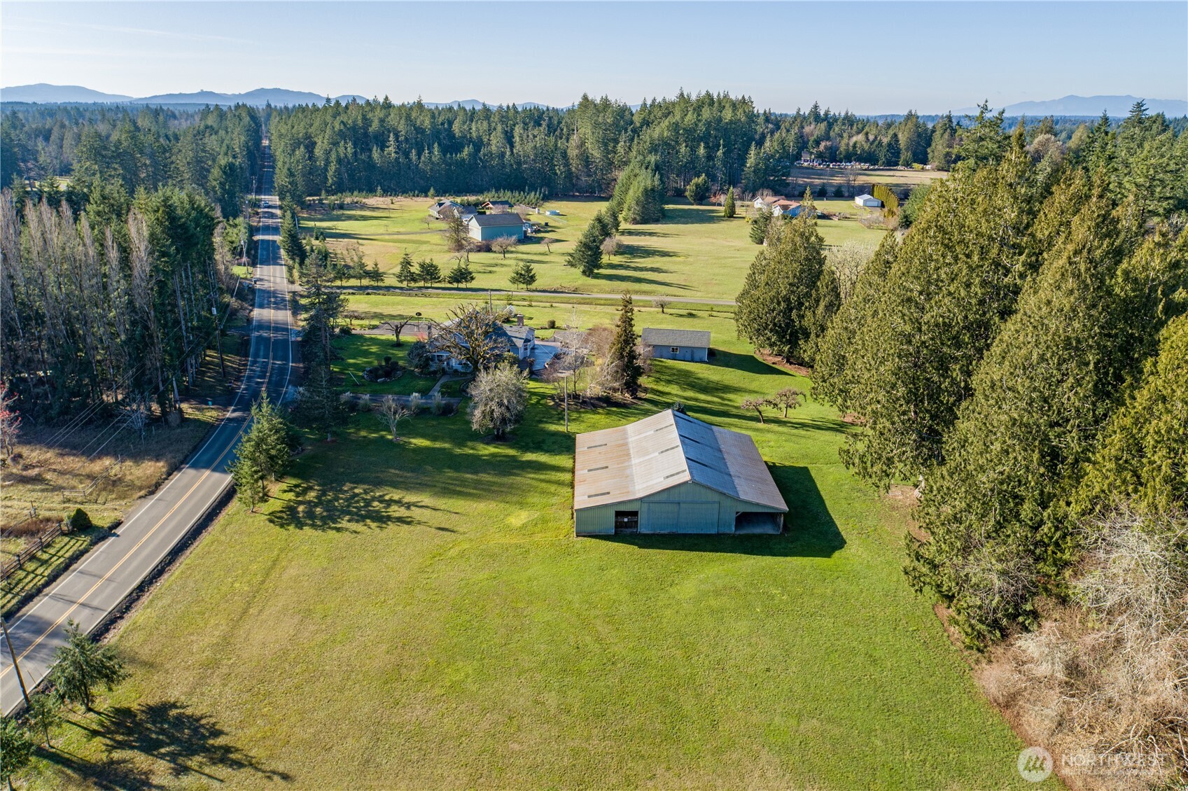 5981 Southeast Arcadia Road Shelton, WA 98584 - Photo 31 of 35 a view of a swimming pool with a patio