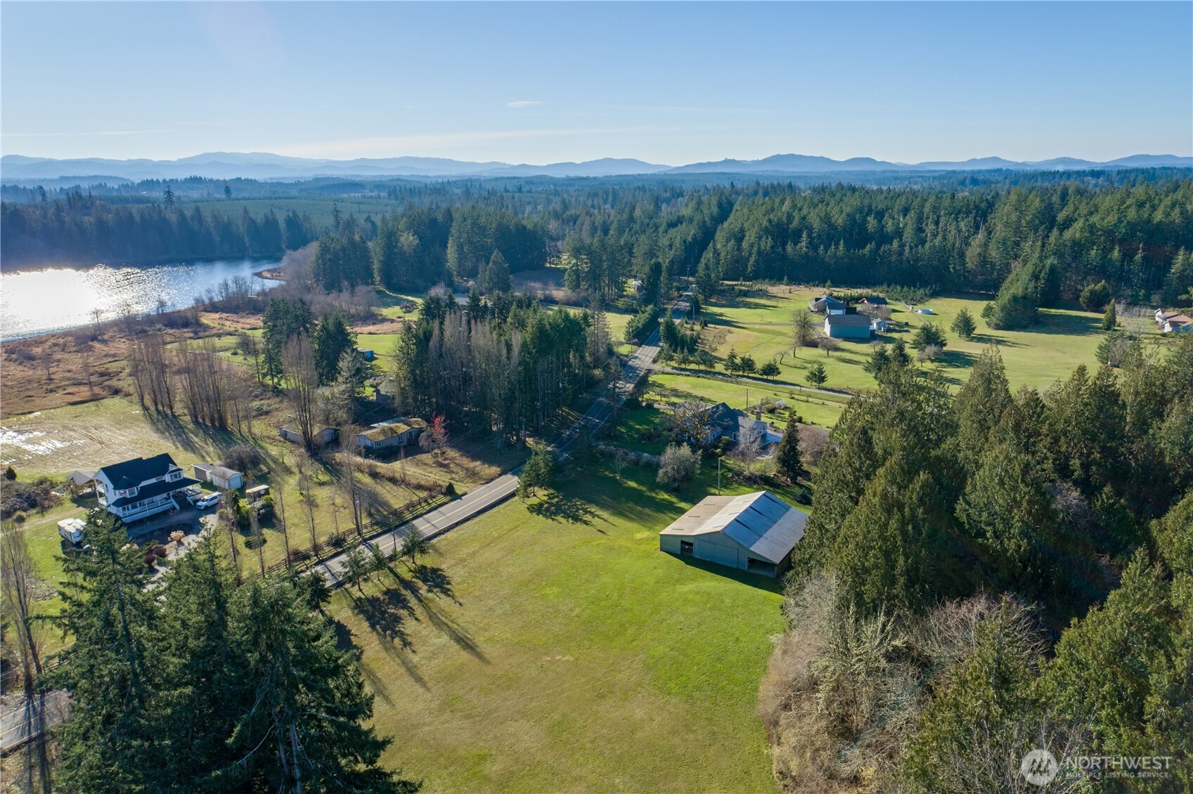 5981 Southeast Arcadia Road Shelton, WA 98584 - Photo 32 of 35 a view of a city with lush green forest