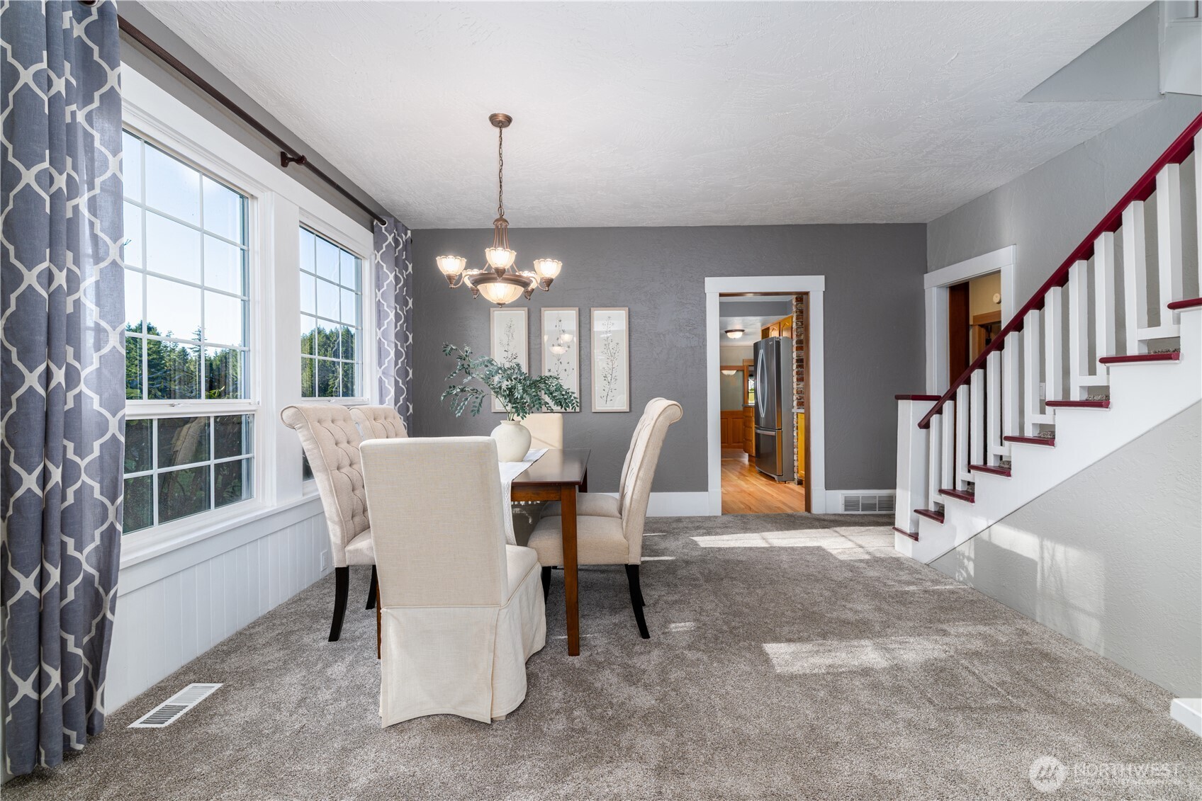 5981 Southeast Arcadia Road Shelton, WA 98584 - Photo 5 of 35 a view of a dining room with furniture window and wooden floor