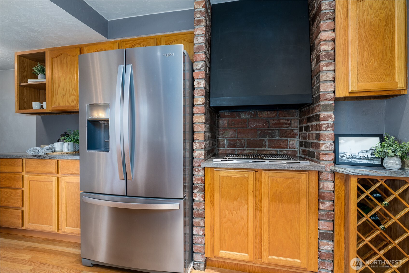 5981 Southeast Arcadia Road Shelton, WA 98584 - Photo 9 of 35 a kitchen with stainless steel appliances granite countertop a refrigerator a stove and a sink