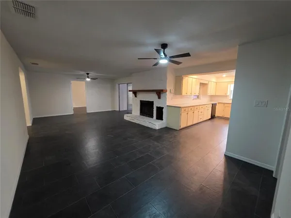 a kitchen with stainless steel appliances a stove and a refrigerator