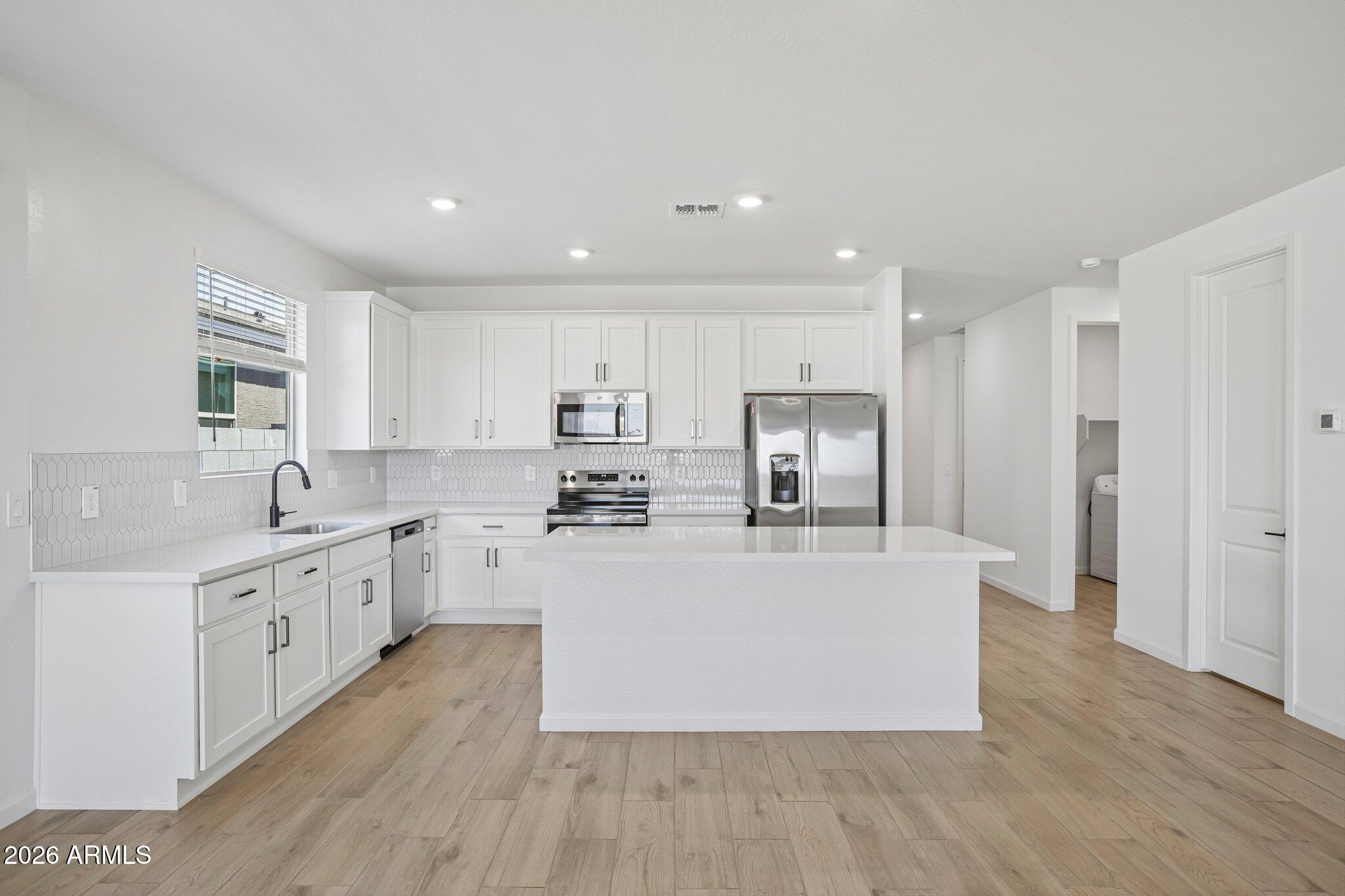 16199 West Red Bird Road Surprise, AZ 85387 - Photo 6 of 22 8-web-or-mls-E Fiddleneck Wy-S0306-008