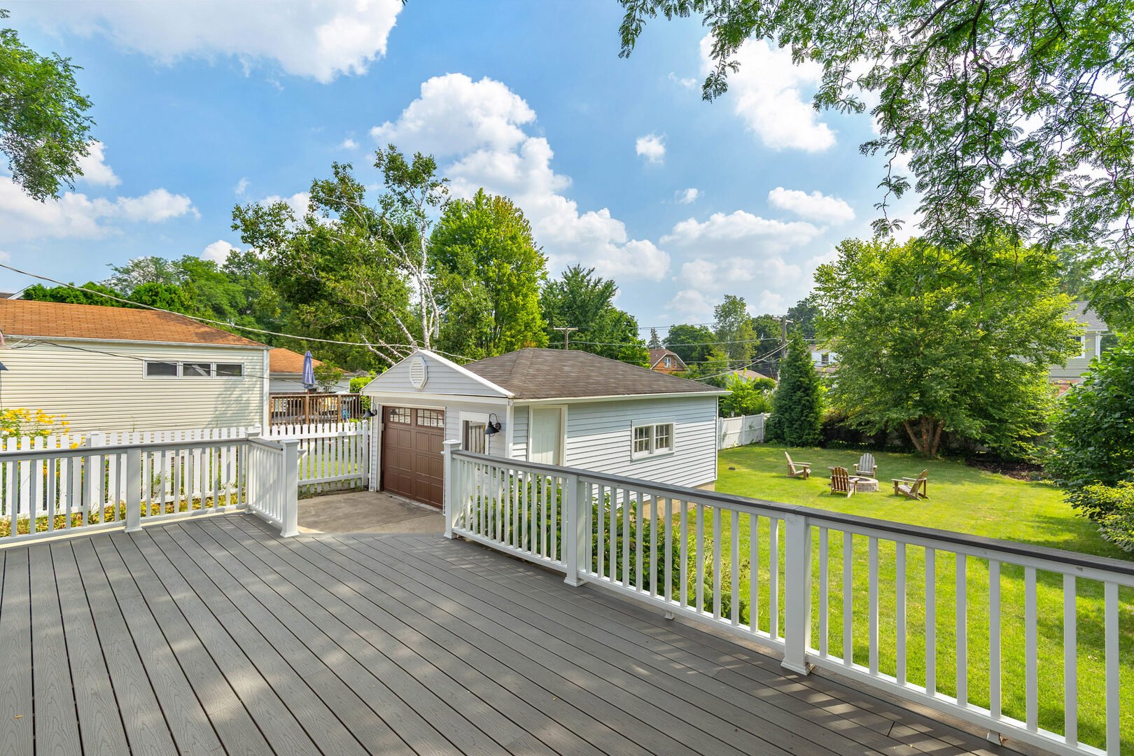 17 North Pine Street Mount Prospect, IL 60056 - Photo 23 of 32 a view of a deck with wooden floor and fence