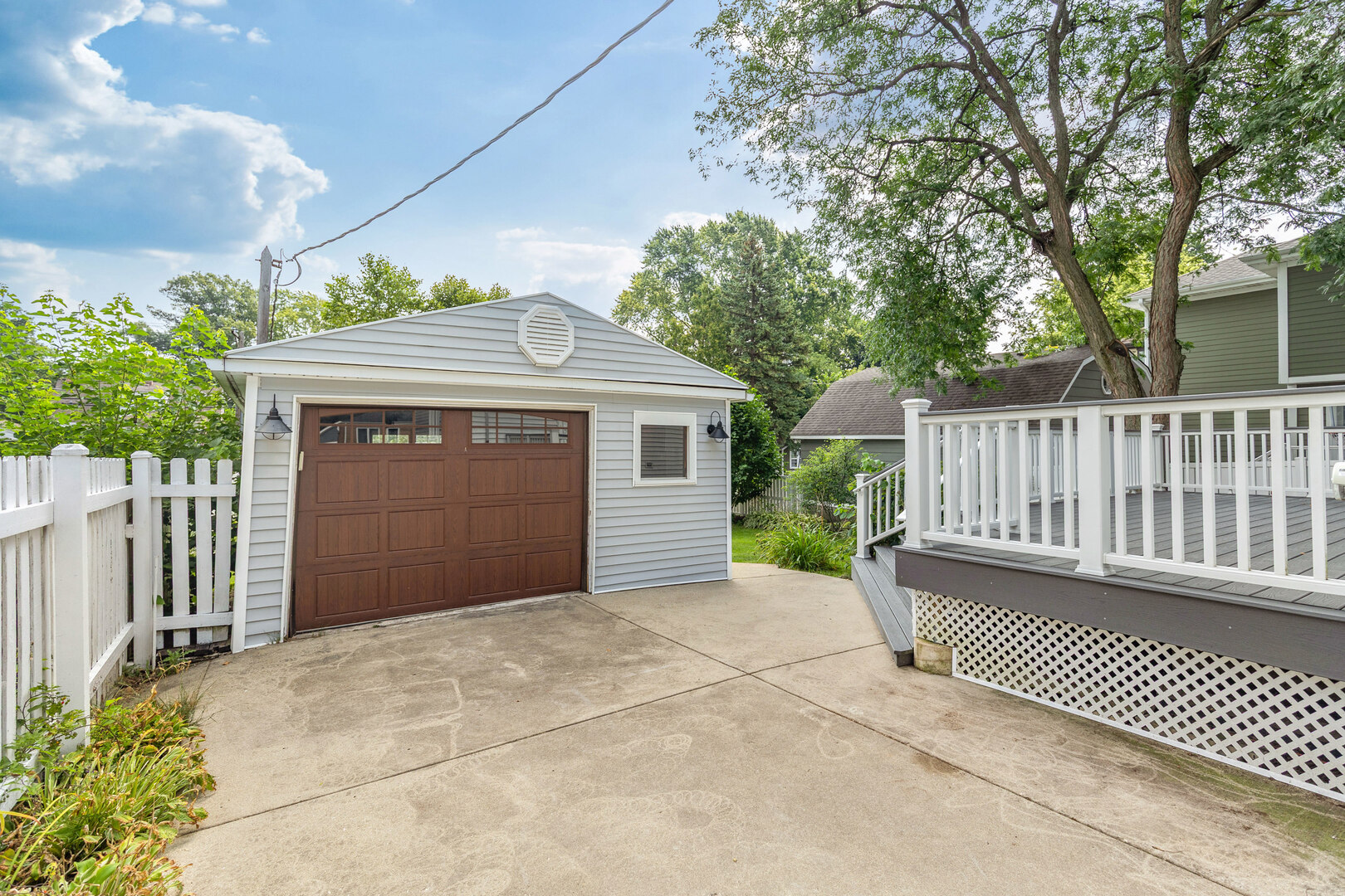 17 North Pine Street Mount Prospect, IL 60056 - Photo 27 of 32 a view of a small house with wooden fence