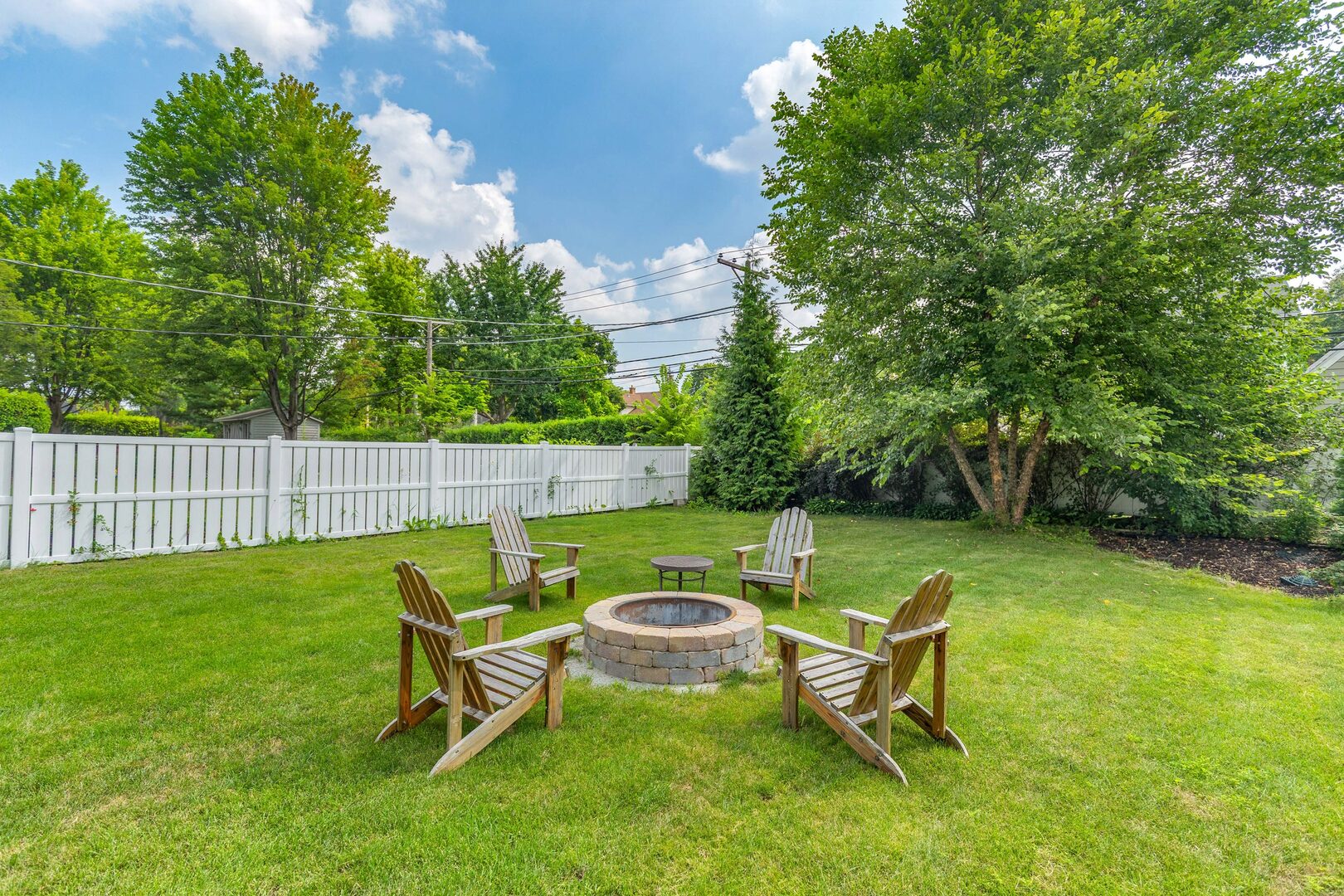 17 North Pine Street Mount Prospect, IL 60056 - Photo 29 of 32 a view of a chair and table in the garden