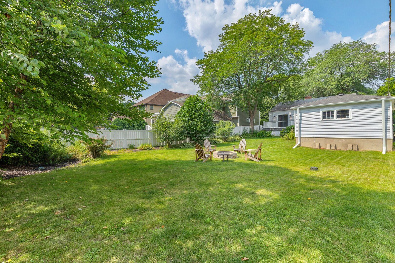 17 North Pine Street Mount Prospect, IL 60056 - Photo 31 of 32 a view of a house with a backyard
