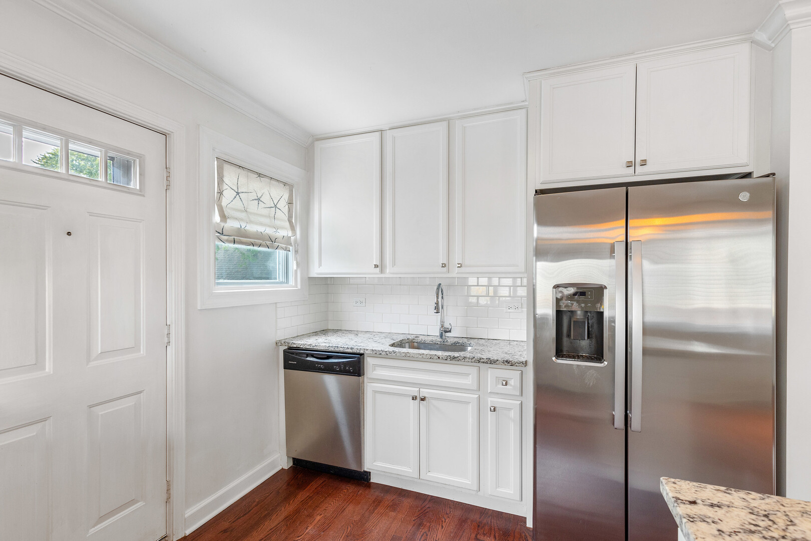 17 North Pine Street Mount Prospect, IL 60056 - Photo 7 of 32 a kitchen with white cabinets and refrigerator