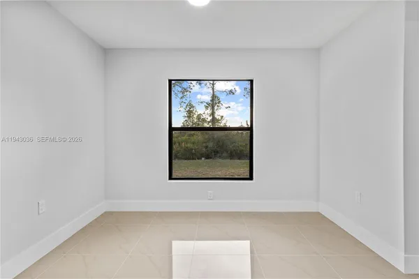 an empty room with a window