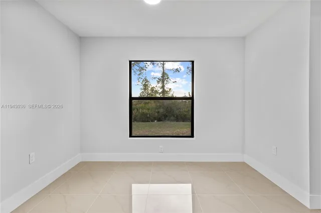 an empty room with a window
