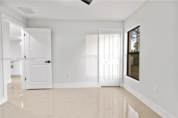 an empty room with windows
