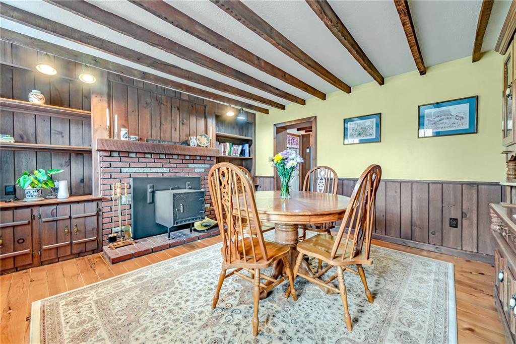 322 Dearth Road Uniontown, PA 15401 - Photo 5 of 25 a dining room with furniture and a fireplace