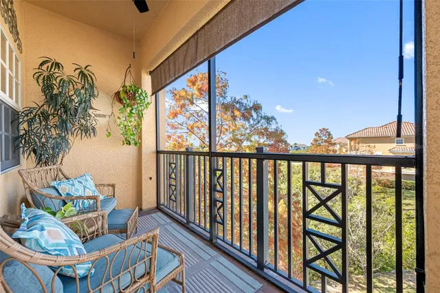 a view of a chairs and table in the patio