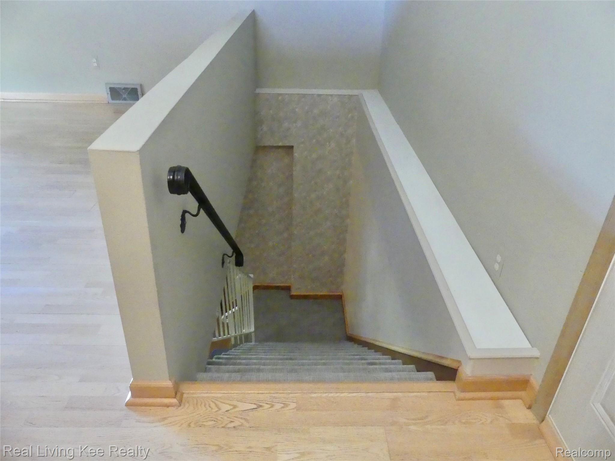 49741 Shelby Road Utica, MI 48317 - Photo 13 of 61 Stairway to lower level