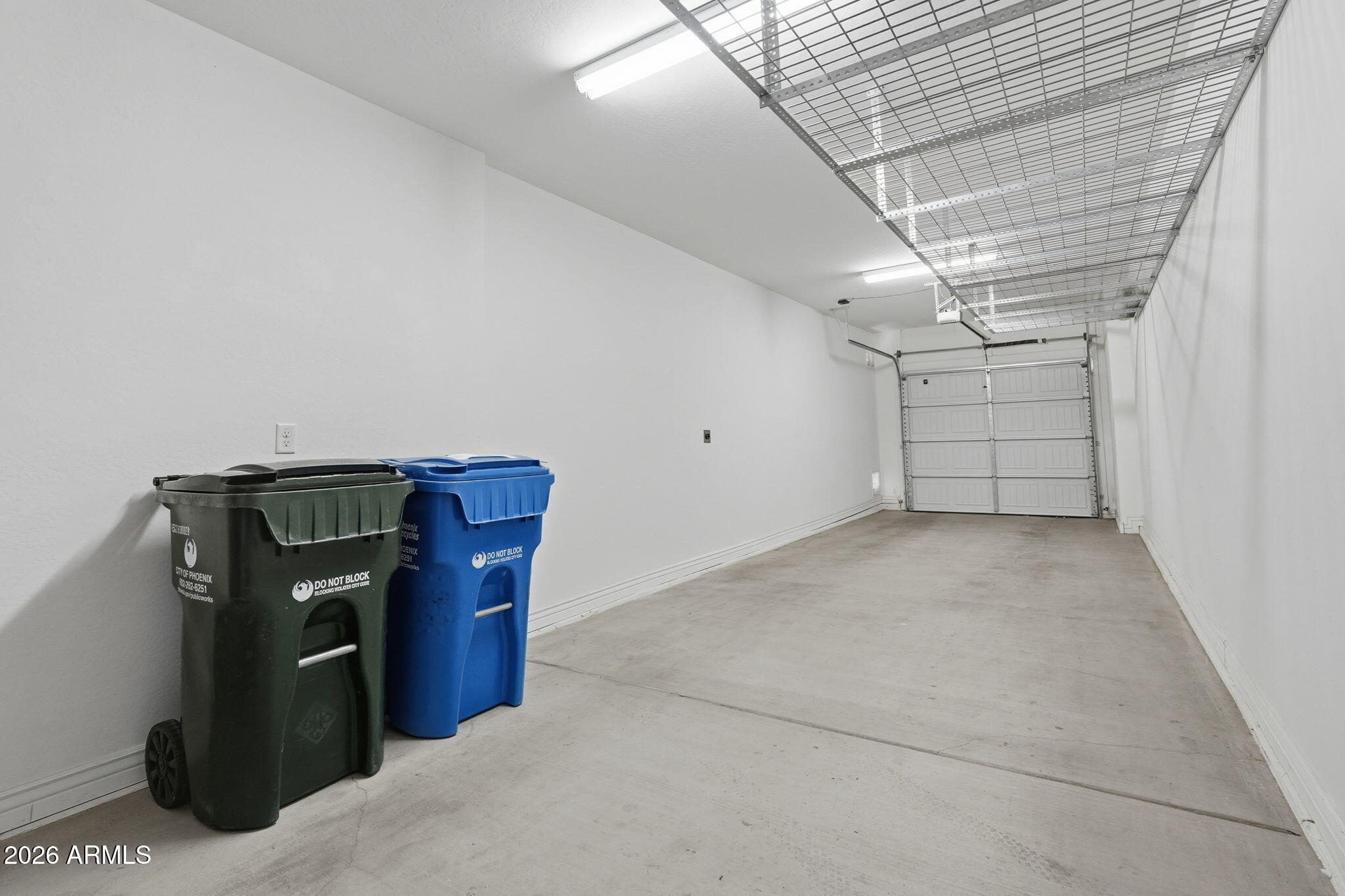 2425 West Bronco Butte Trail, Unit 1011 Phoenix, AZ 85085 - Photo 32 of 64 2 car garage