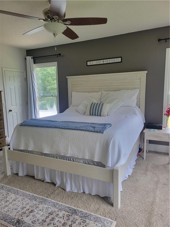 184 Scott Circle Toccoa, GA 30577 - Photo 17 of 52 a bedroom with a bed and a window