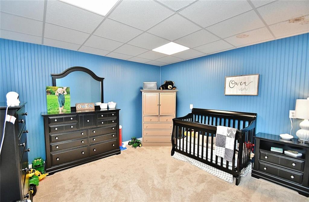 184 Scott Circle Toccoa, GA 30577 - Photo 23 of 52 a bedroom with a bed and a dresser