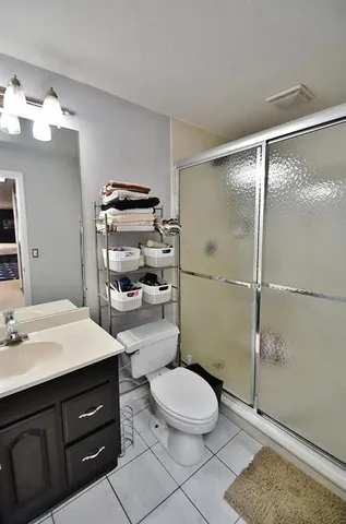 a room with lots of furniture and a flat screen tv