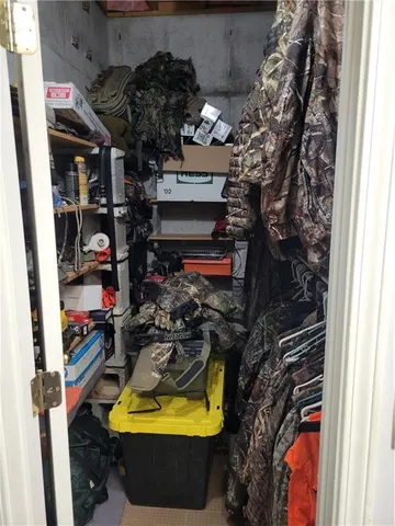 a room with furniture and gym equipment