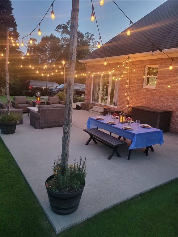 184 Scott Circle Toccoa, GA 30577 - Photo 34 of 52 a backyard of a house with yard fire pit and outdoor seating