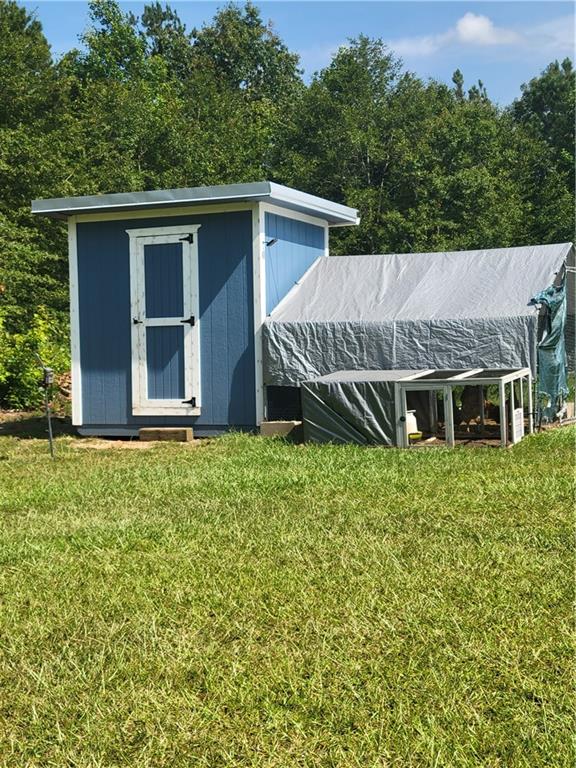184 Scott Circle Toccoa, GA 30577 - Photo 45 of 52 a view of a house with a yard and wooden fence