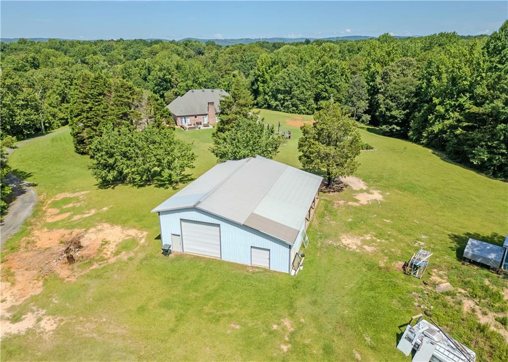 184 Scott Circle Toccoa, GA 30577 - Photo 7 of 52 a view of a big yard with an outdoor seating