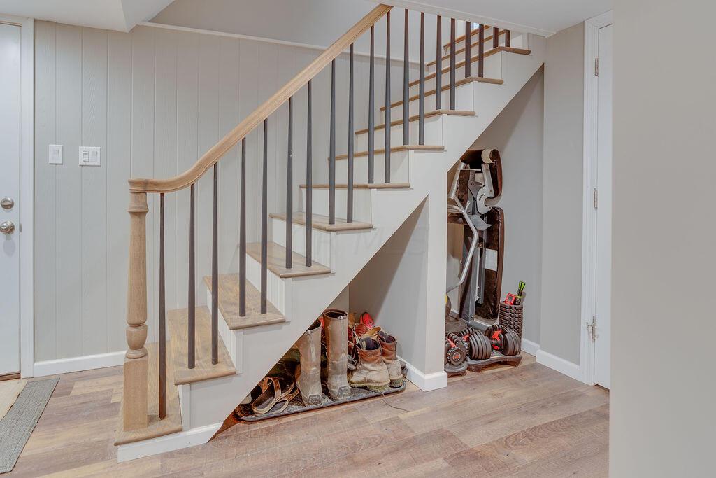 4065 Harlem Road Galena, OH 43021 - Photo 38 of 64 Basement stairs with rod iron spindles