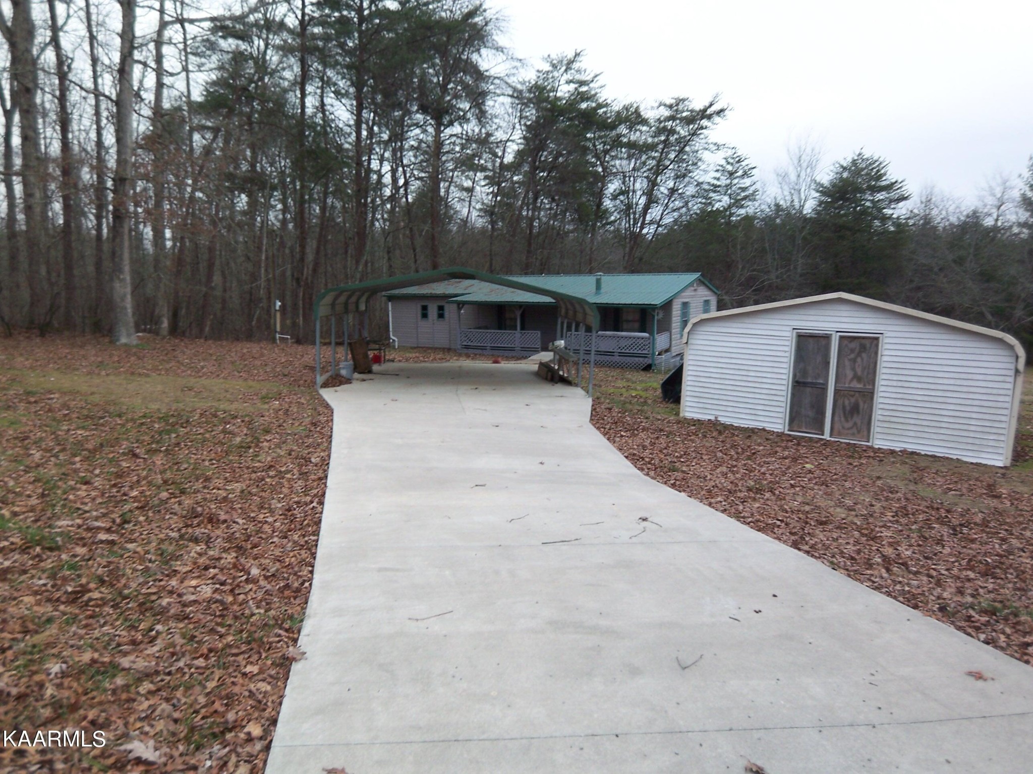 415 Kerrigan Road Crossville, TN 38555 - Photo 2 of 18 a house view with a outdoor space