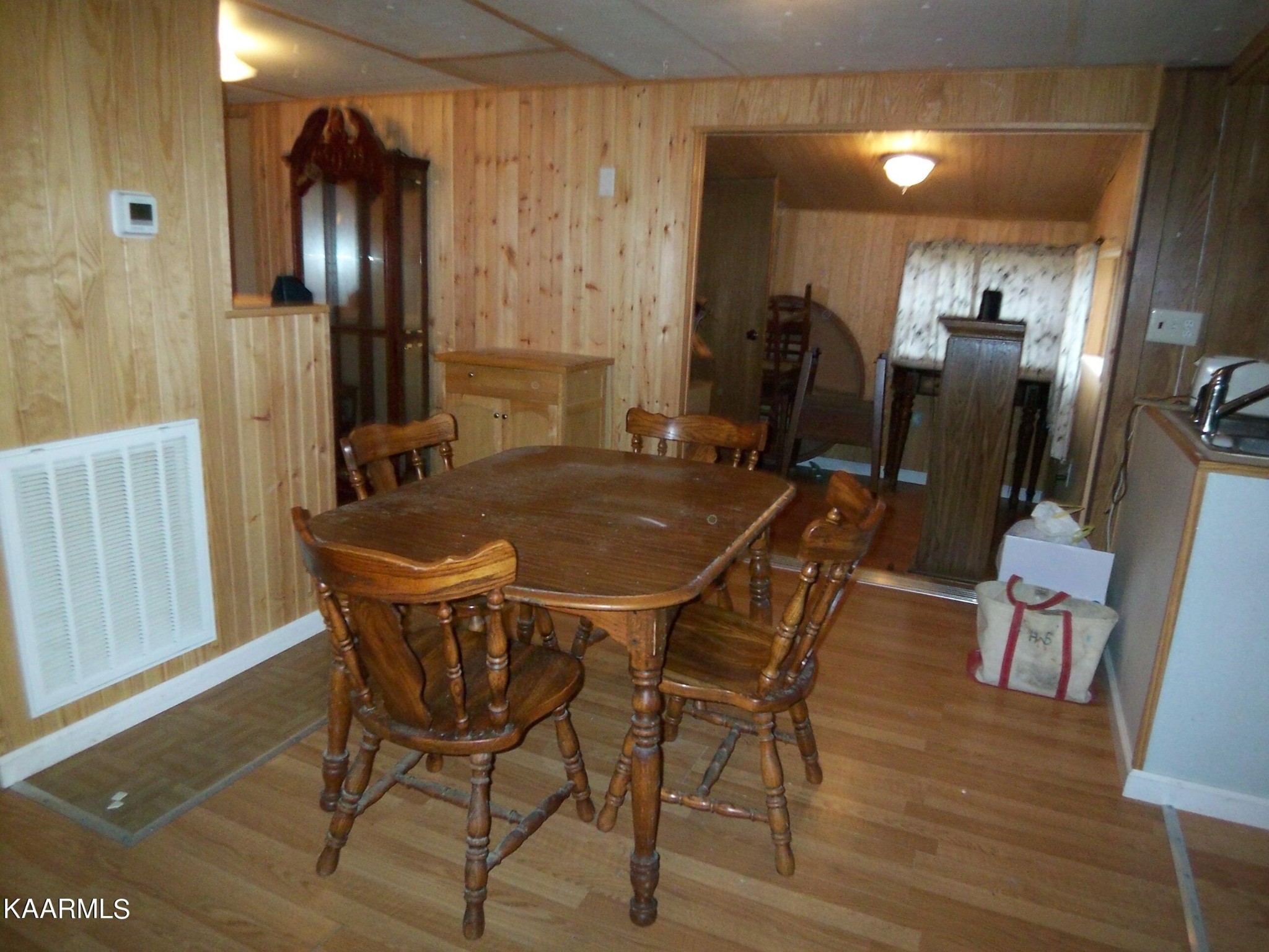 415 Kerrigan Road Crossville, TN 38555 - Photo 5 of 18 a dining room with furniture and chandelier