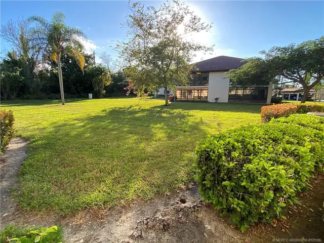 a view of a house with a swimming pool
