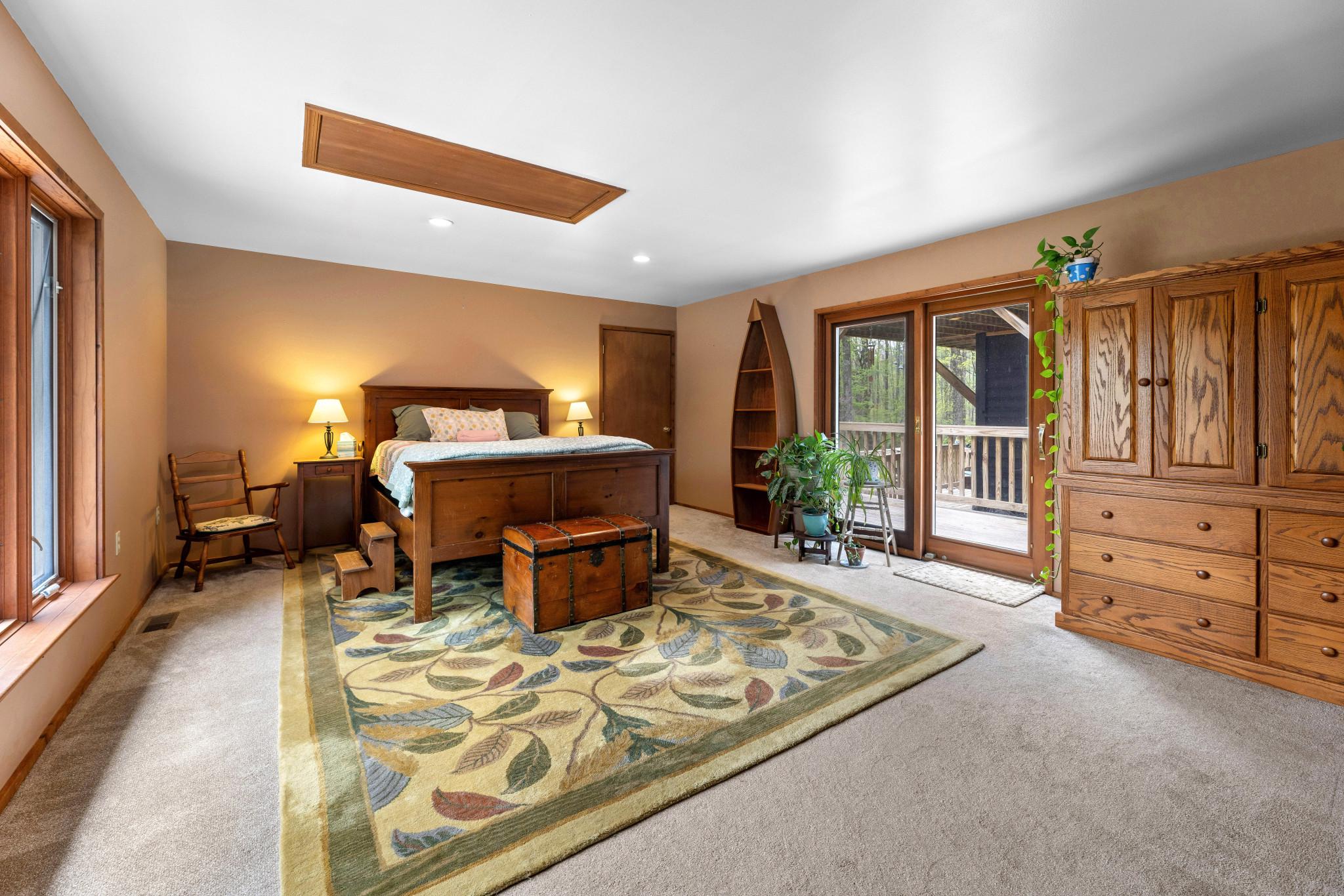 902 Harris Hollow Road Washington, VA 22747 - Photo 11 of 54 a living room with furniture gym equipment and a large window