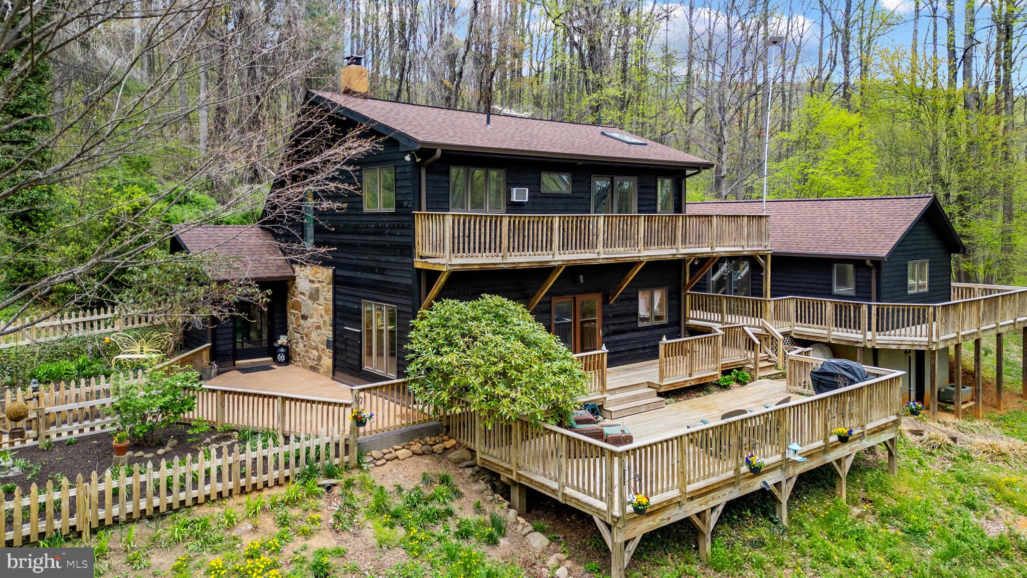902 Harris Hollow Road Washington, VA 22747 - Photo 2 of 54 a view of house with roof deck and seating space
