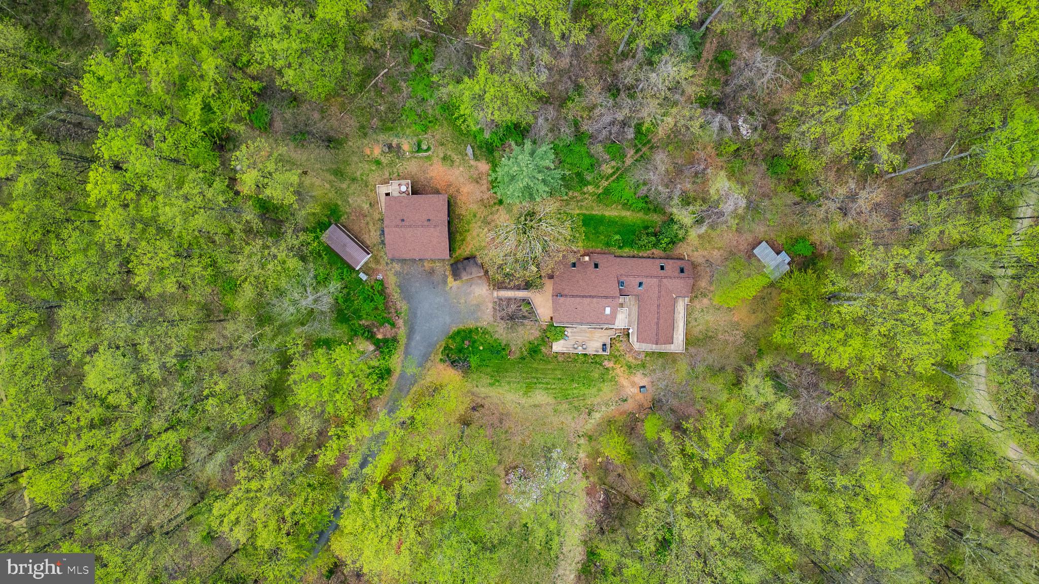 902 Harris Hollow Road Washington, VA 22747 - Photo 39 of 54 an aerial view of residential house with outdoor space and trees all around