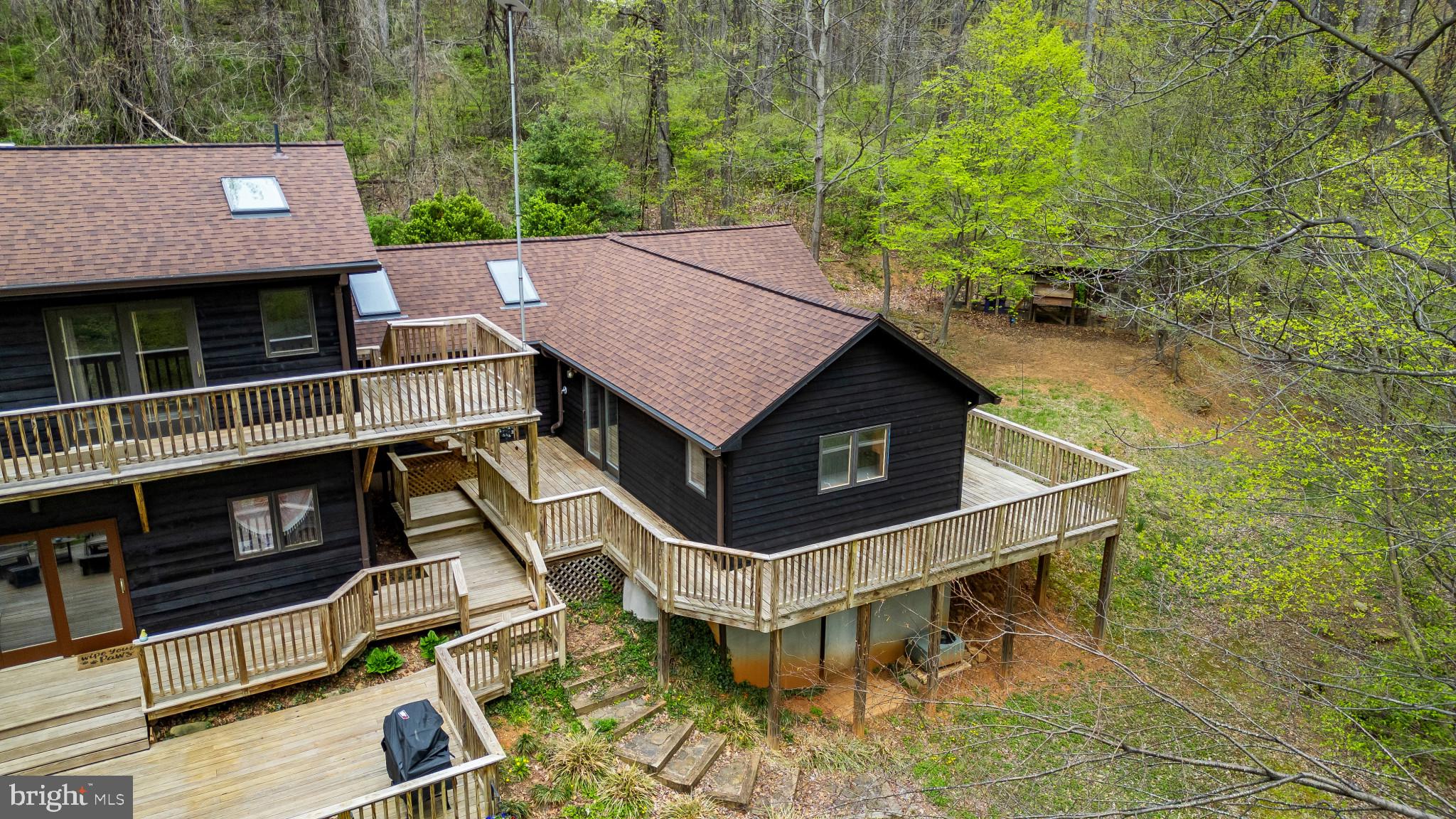 902 Harris Hollow Road Washington, VA 22747 - Photo 40 of 54 a aerial view of a house with a yard