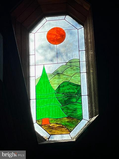 902 Harris Hollow Road Washington, VA 22747 - Photo 4 of 9 Vibrant stained glass depicting nature's beauty.