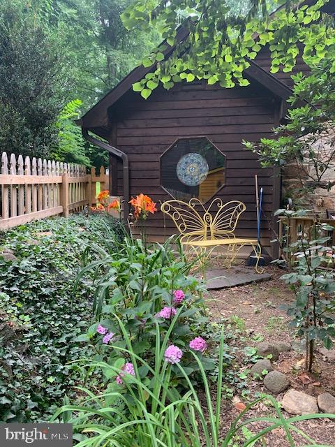 902 Harris Hollow Road Washington, VA 22747 - Photo 8 of 9 Charming garden retreat with vibrant blooms.