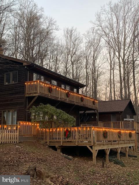 902 Harris Hollow Road Washington, VA 22747 - Photo 9 of 9 Charming cabin adorned with twinkling lights.