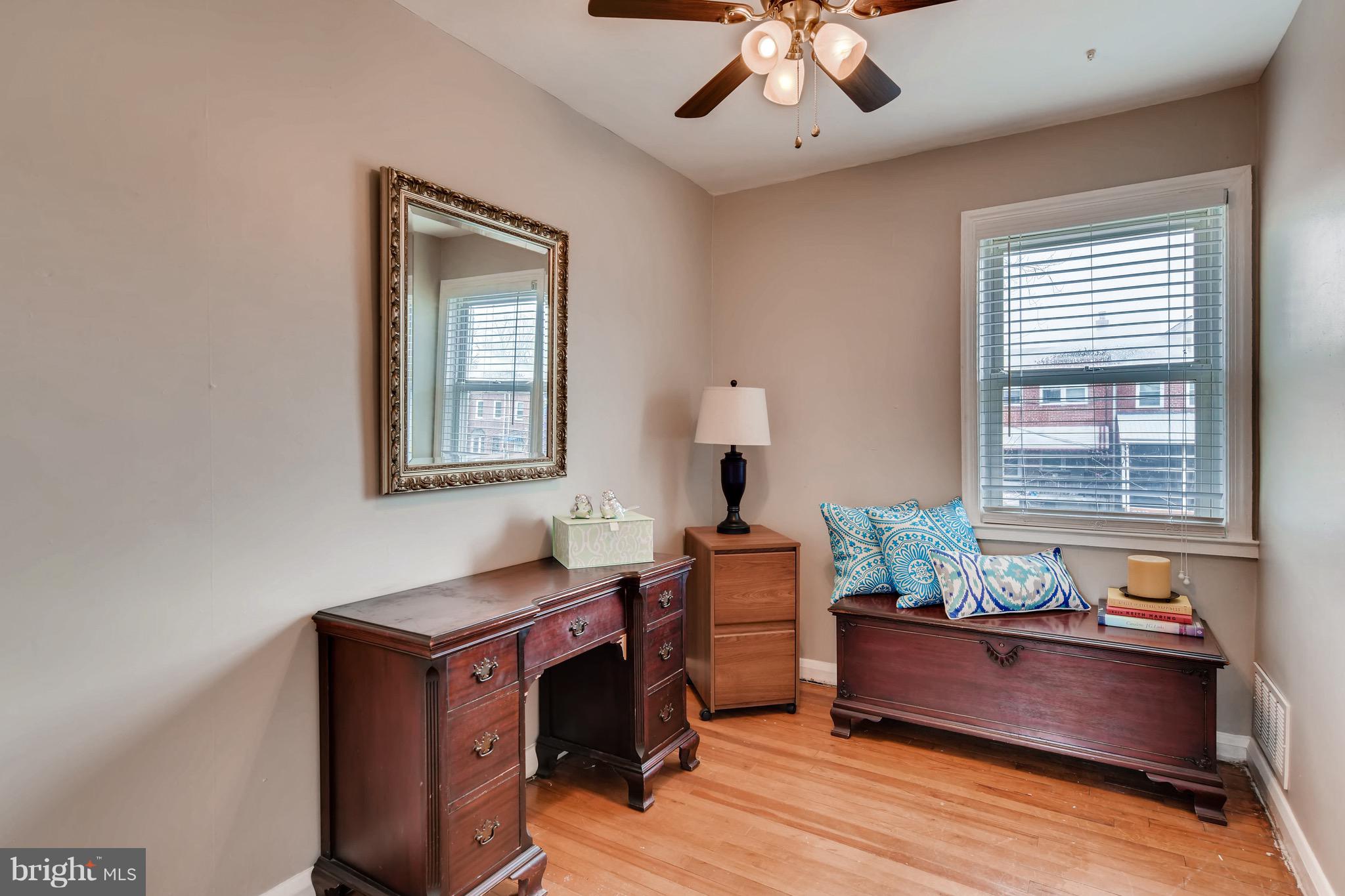 8315 Ridgely Oak Road Baltimore, MD 21234 - Photo 16 of 26 a room with furniture and window