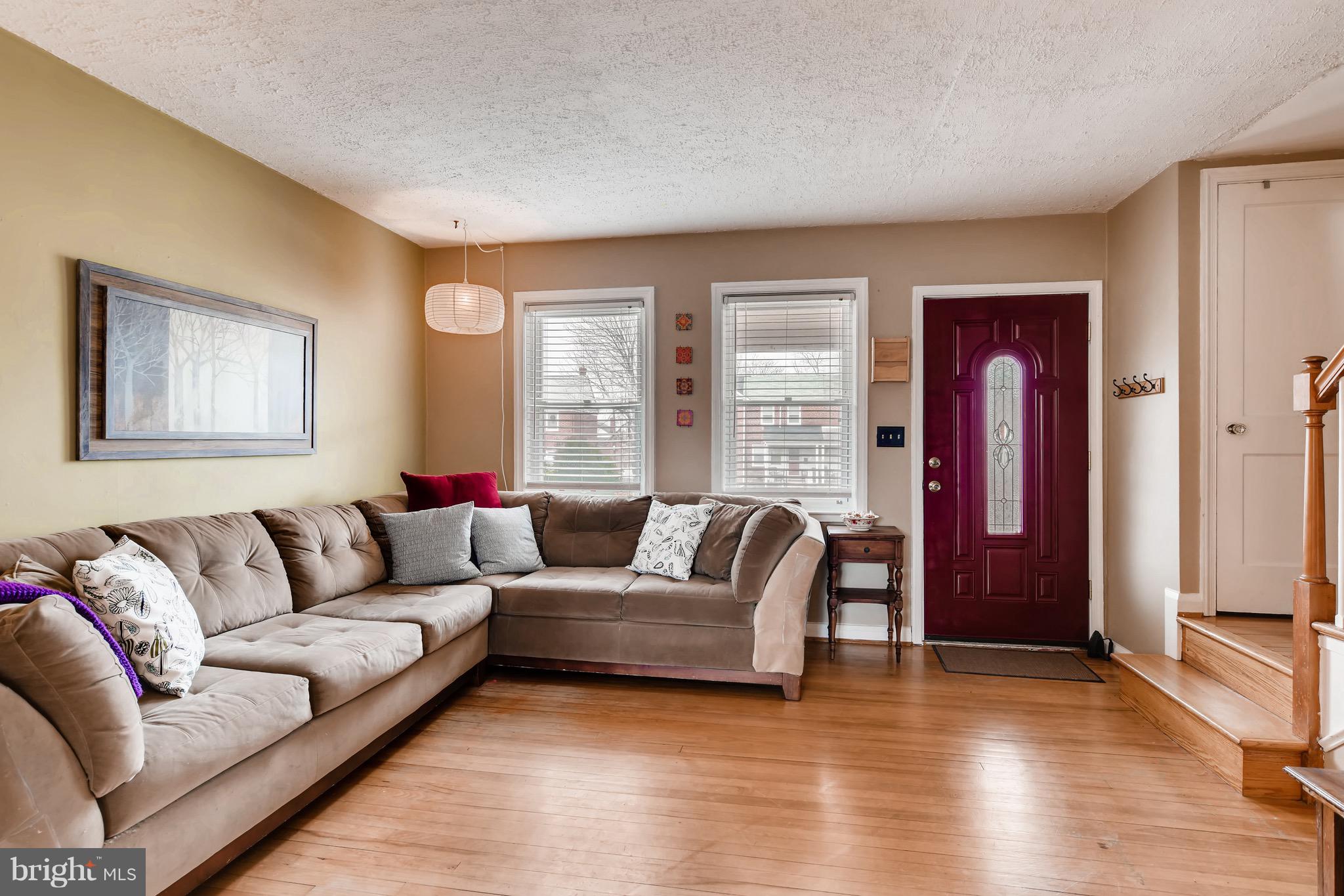 8315 Ridgely Oak Road Baltimore, MD 21234 - Photo 5 of 26 a living room with furniture and a window