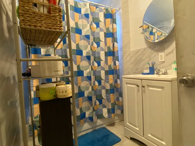 a kitchen with cabinets and window